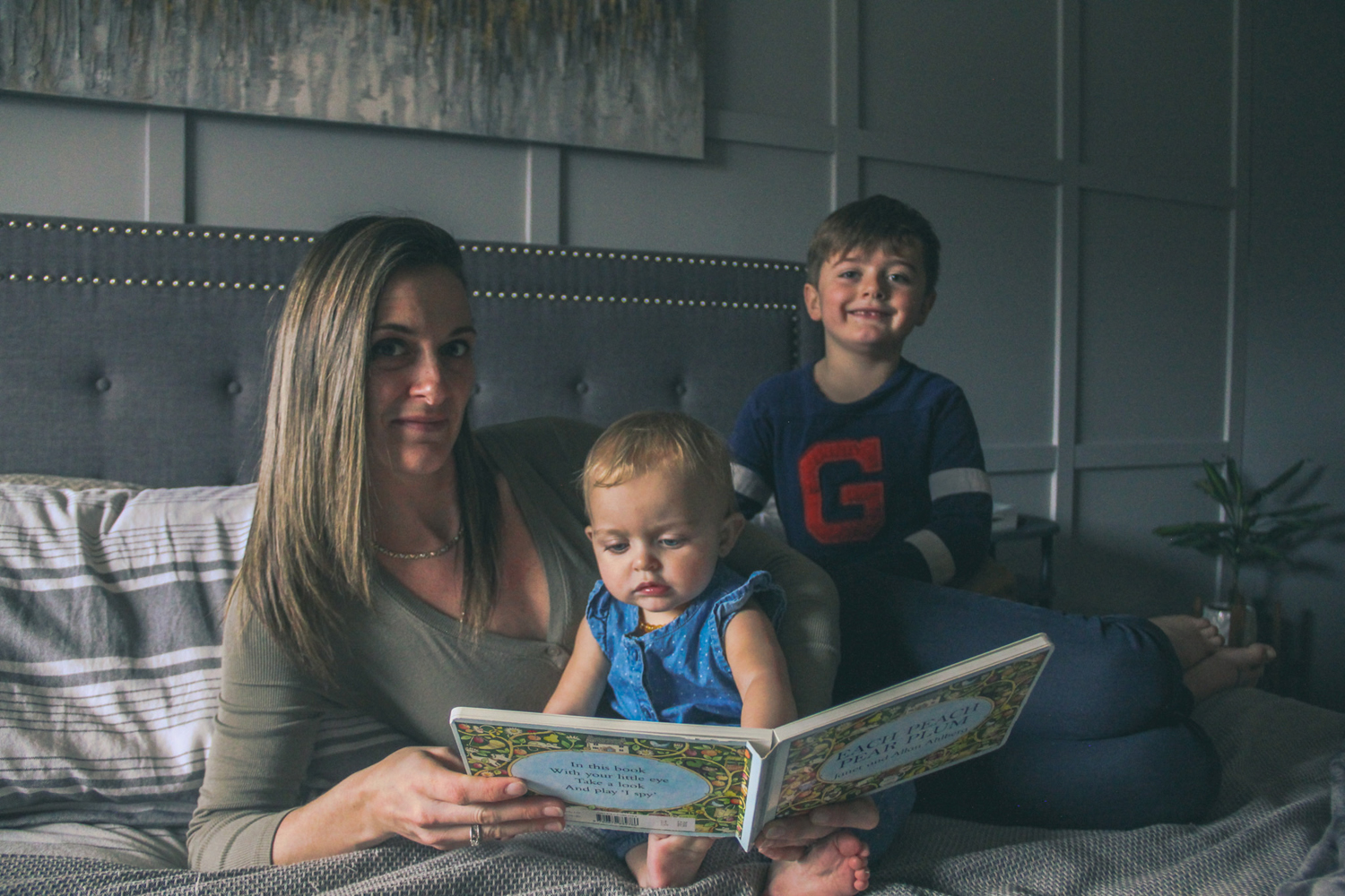 Katrina reading with her children